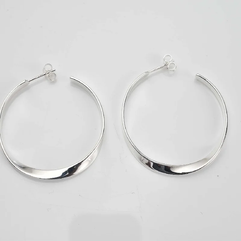 Ladies diamond earrings-Sleek Horizon Twist Hoops