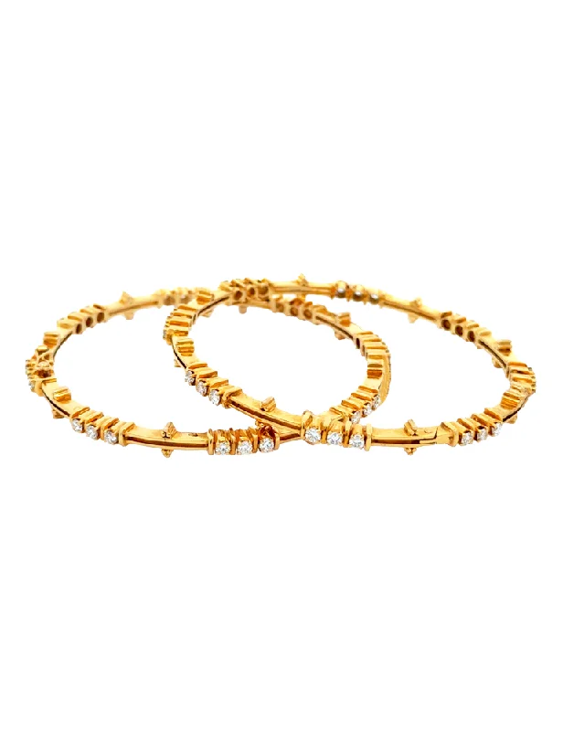 Ladies tennis bangles-A Pair of Diamond Bangles - 18 Kt