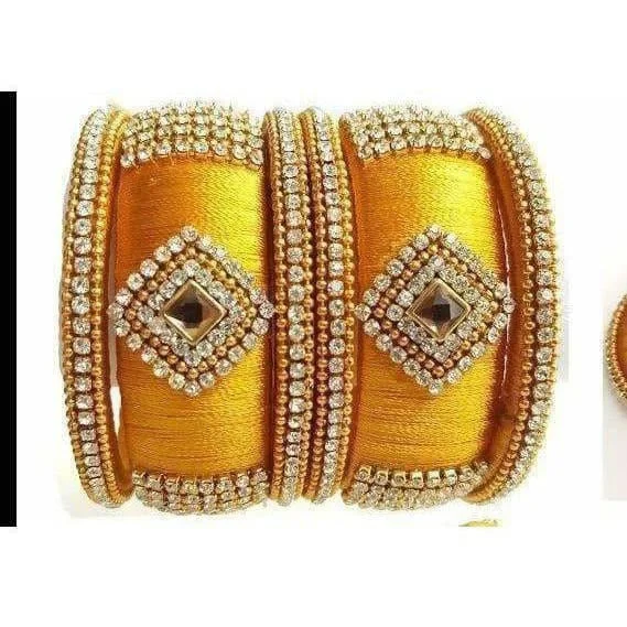 Ladies chunky gold bracelets-Yellow Color Silk Threaded with Diamond shape White Stone Bangles