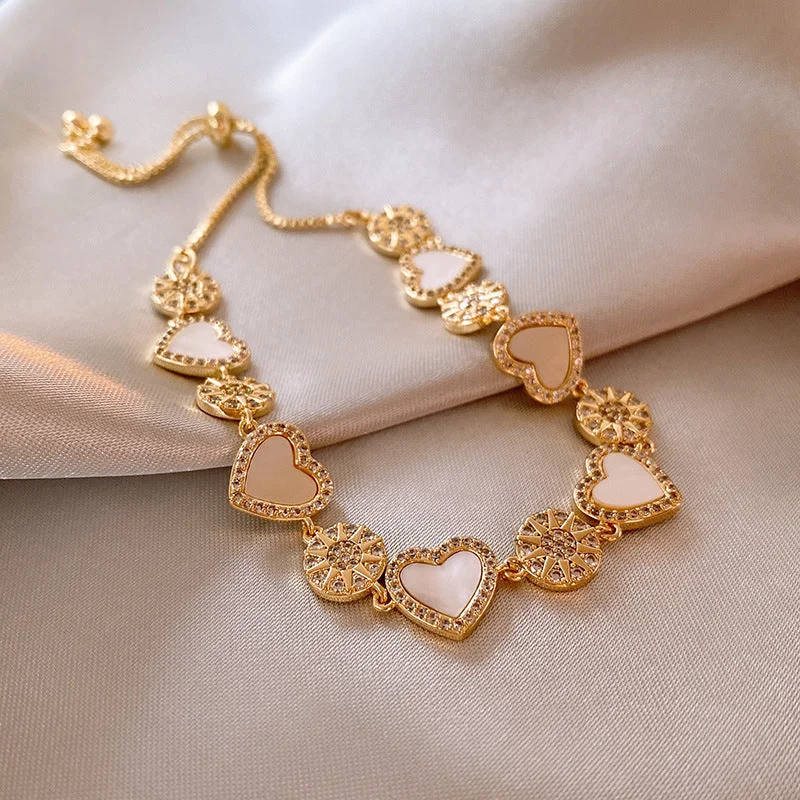 34# Golden Sun Heart Bracelet. (Real Gold Plating)