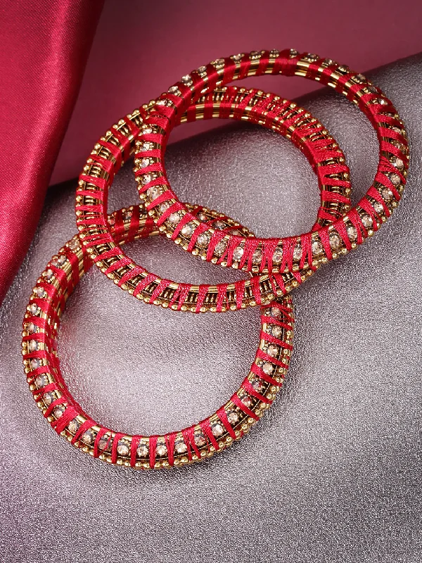 Ladies engraved gold bracelets-Priyaasi Women Set Of 4 Stones Studded Silk Threaded Bangles in Maroon Color