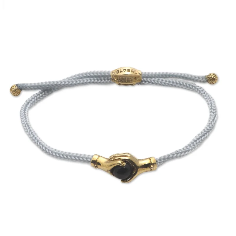 Ladies elegant bangles-Novica Handmade Golden Grey Handshake Brass And Black Agate Unity Bracelet