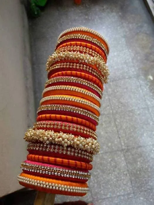 Ladies cuff bracelets-Pink & Orange Silk Threaded Pearl & Stone Bridal Wear Bangles Set